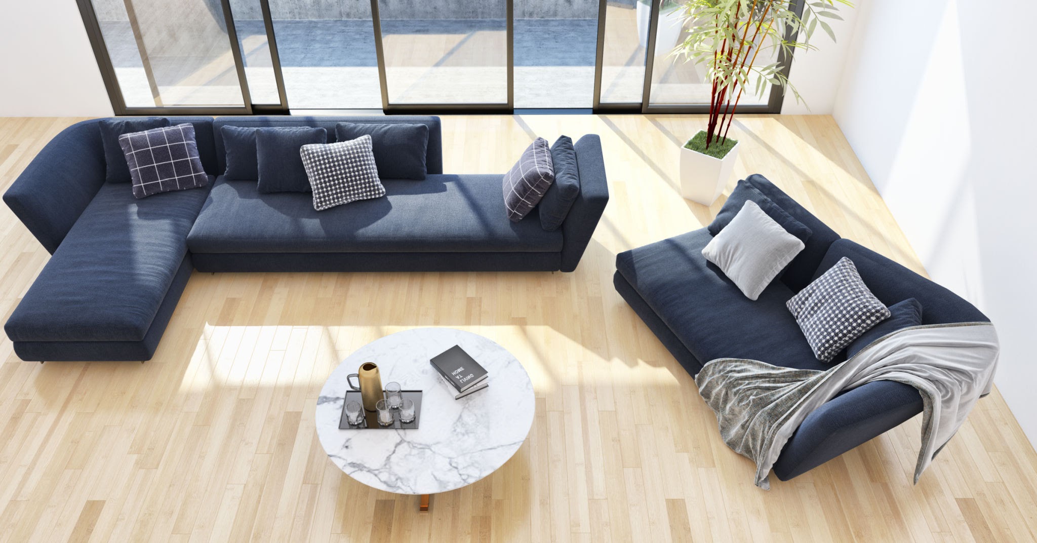 Tapicerowany narożnik wypoczynkowy w granatowym kolorze w nowoczesnym i przestronnym salonie